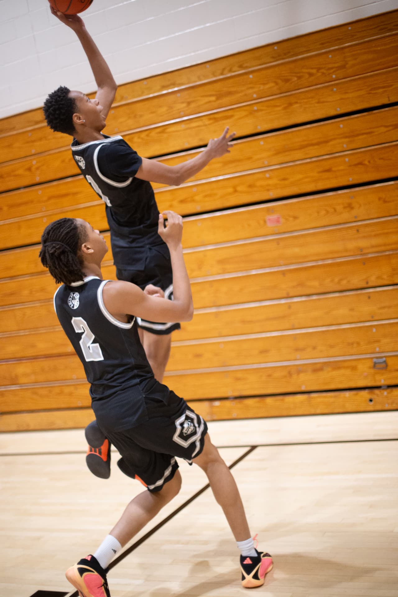 Sports action — two Shiloh hoopers battling for the board in the paint