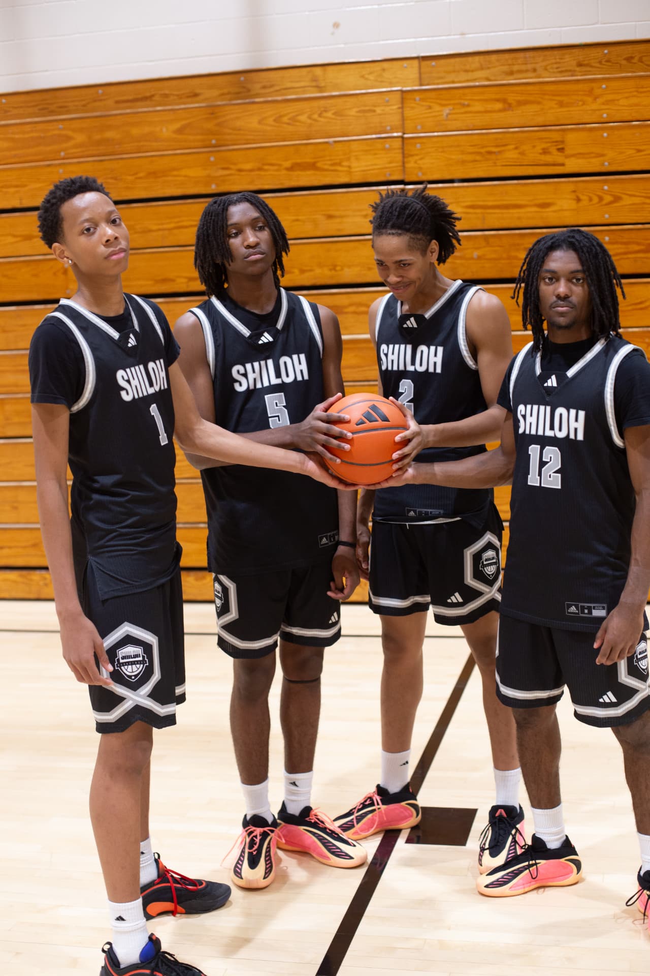 Sports team — the Shiloh squad of four posing with the ball