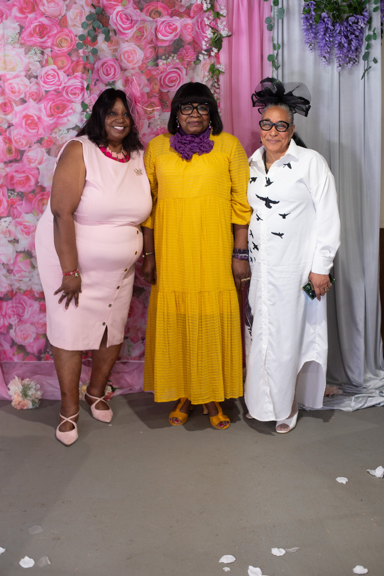 Event photography — the tea party trio by the roses