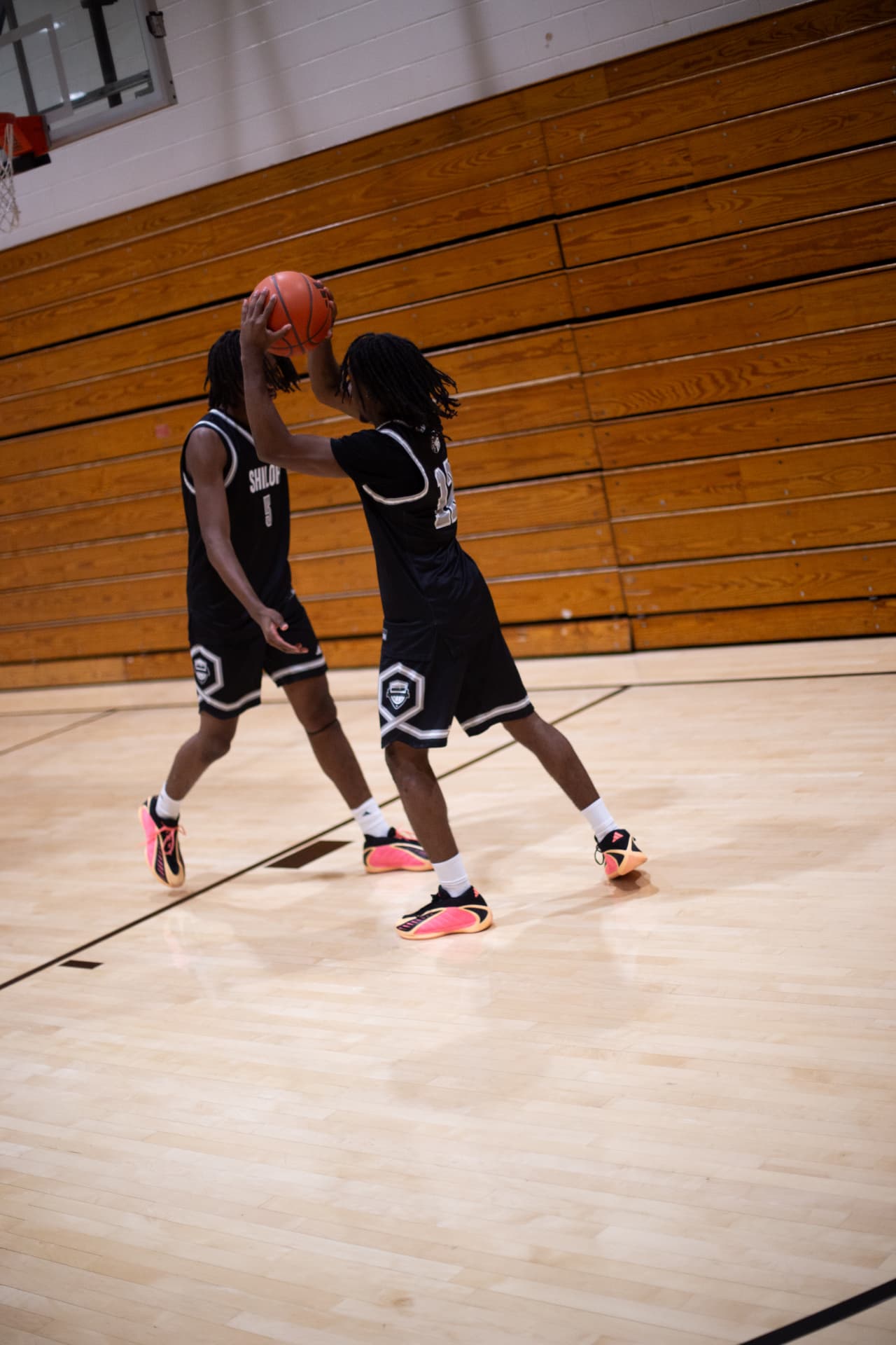Sports action — Shiloh teammates running the two-man game