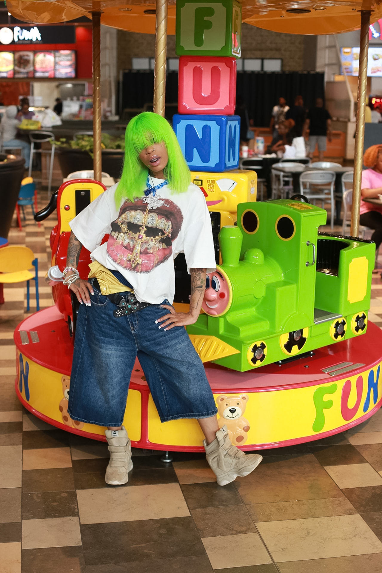 Celebrity portrait — bold green hair, full character