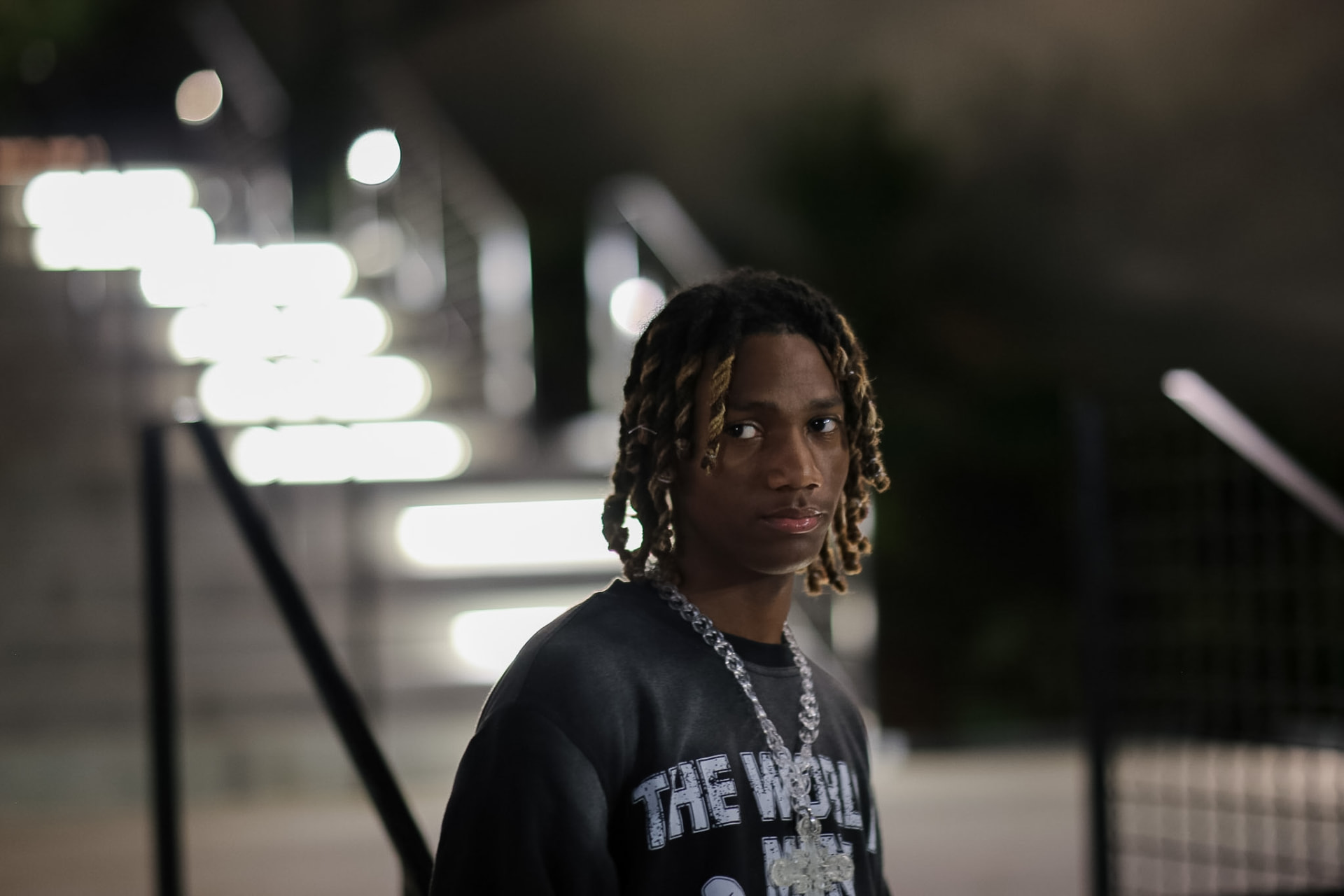 Streetwear brand lookbook — graphic crewneck portrait